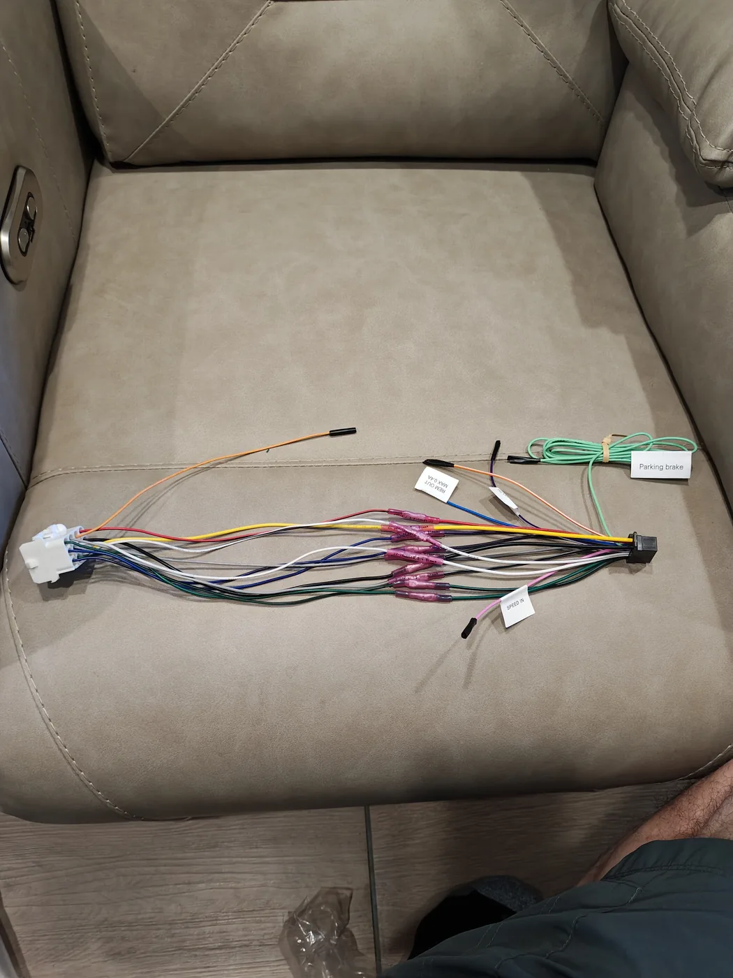 Garmin and Sony wiring harnesses ready to be matched and spliced